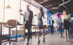 Group of people working in modern office Group of young business people are working together in modern office with laptop, tablet, smart phone, notebook. Successful team in coworking. Freelancers.