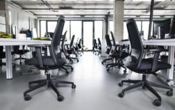 The interior of big empty modern office after work. Big empty modern office after work. The interior of working office space.